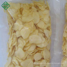 wholesale Chinese bulk grade A organic roasted garlic flakes with root at best price